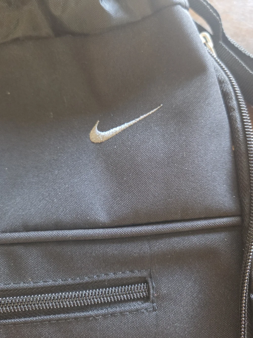 Nike Black Drawstring-Top Backpack with Front Zip Pocket